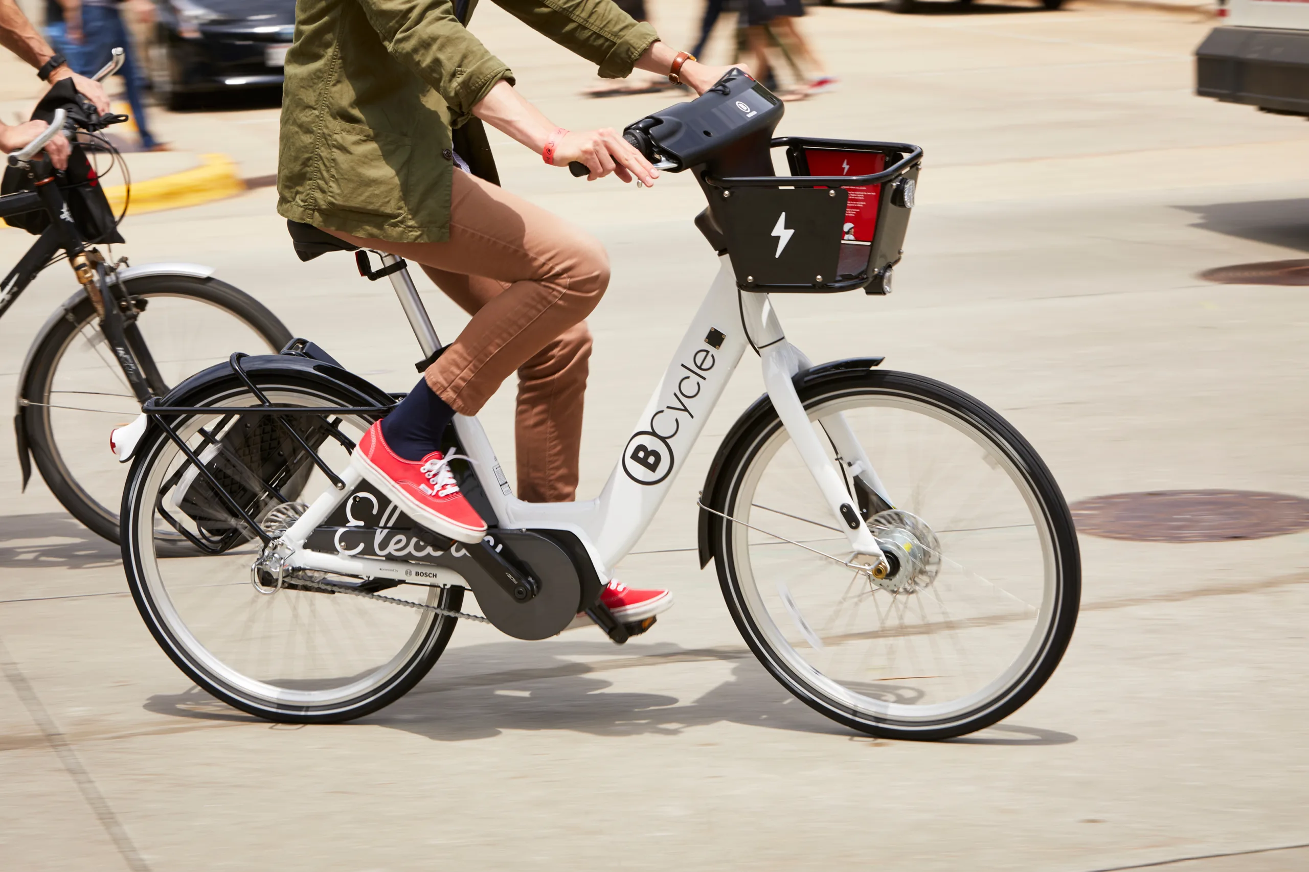 a person riding a BCycle bike share bicycle